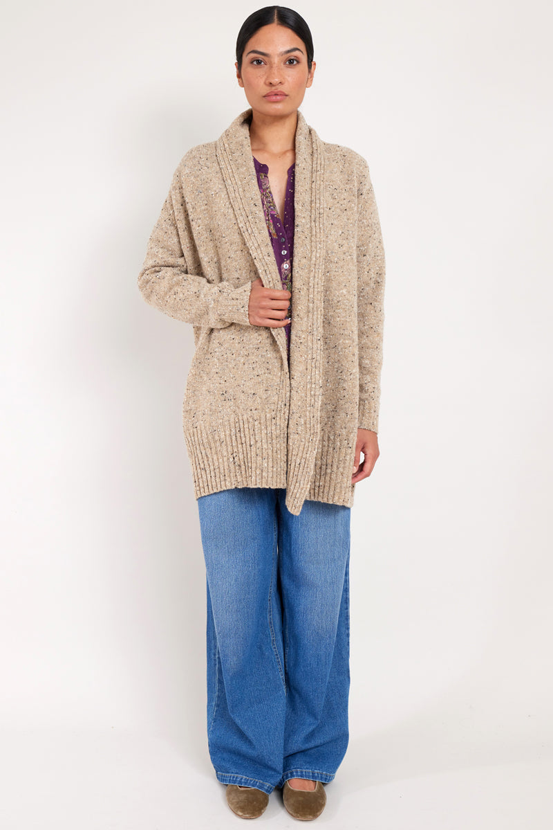 Model wears oat longline knit cardigan